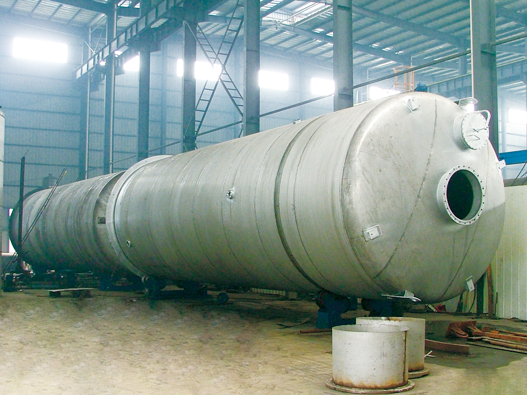 Series vertical storage tanks